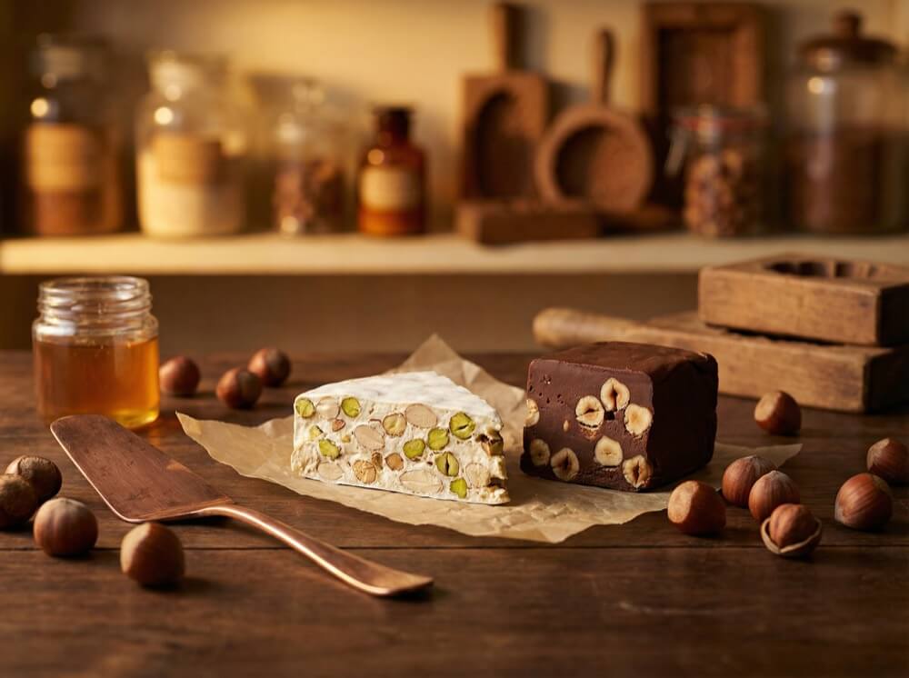 Nougat in de confiserie: geschiedenis, productie en soorten